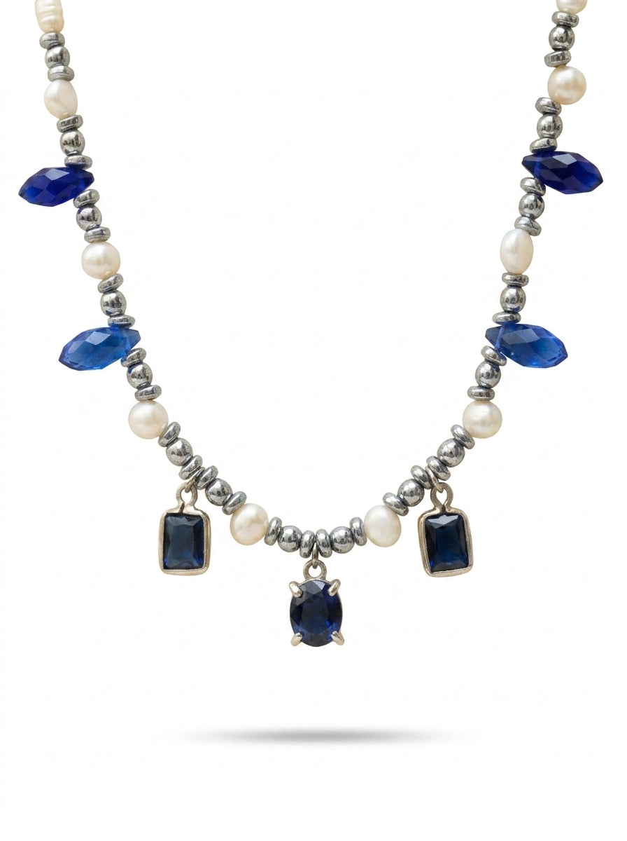 White and grey pearl
Hematite 
Blue crystal 
Blue Cubic zirconia pendants 
Sterling silver 925