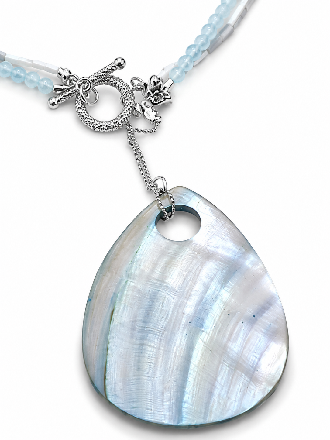 Ocean veil.   
Baby blue agate 
Mother of pearl 
Mother of pearl pendant 
Sterling Silver 925