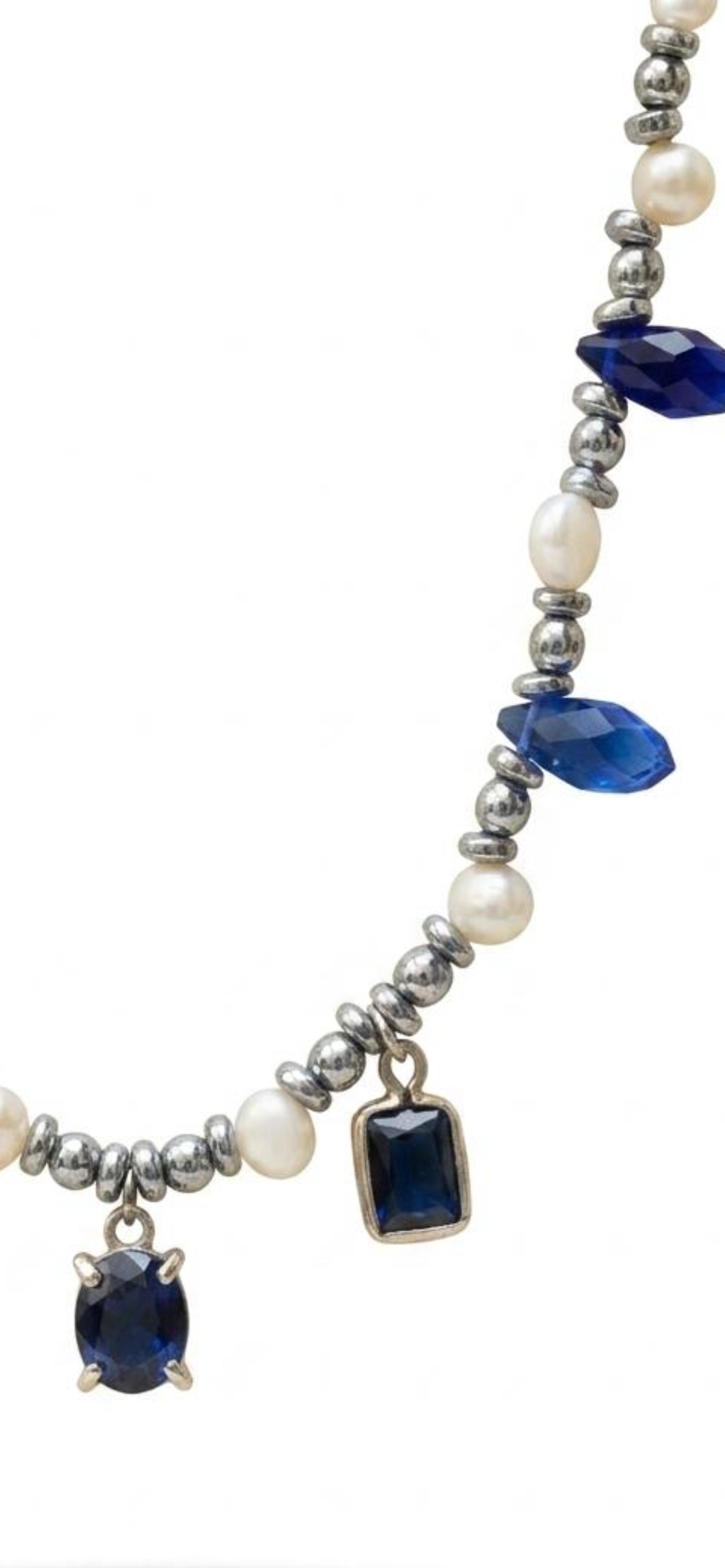 White and grey pearl
Hematite 
Blue crystal 
Blue Cubic zirconia pendants 
Sterling silver 925