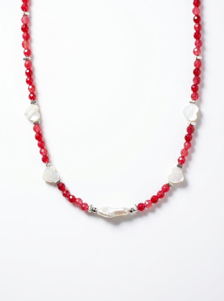 Pink jade 
Mother of pearl 
Pearl 
Hematite 
Sterling silver 925