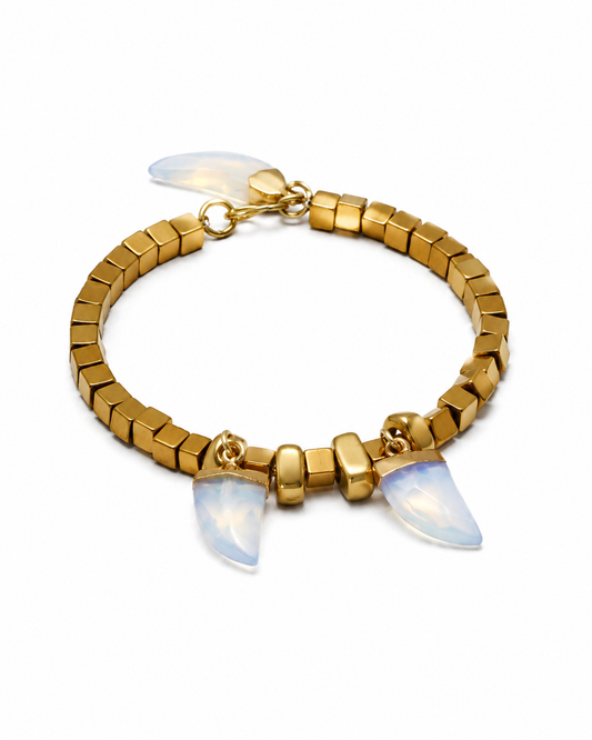 Arctic glow.      
Apwolite
Hematite gold plated 
Sterling silver 925 gold plated