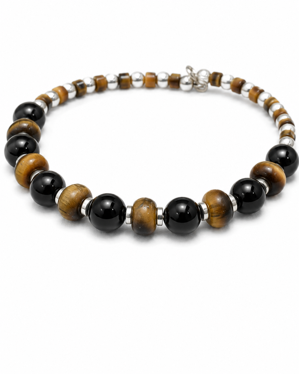 Nomad.        
Tiger eye
Onyx 
Hematite 
Sterling Silver 925