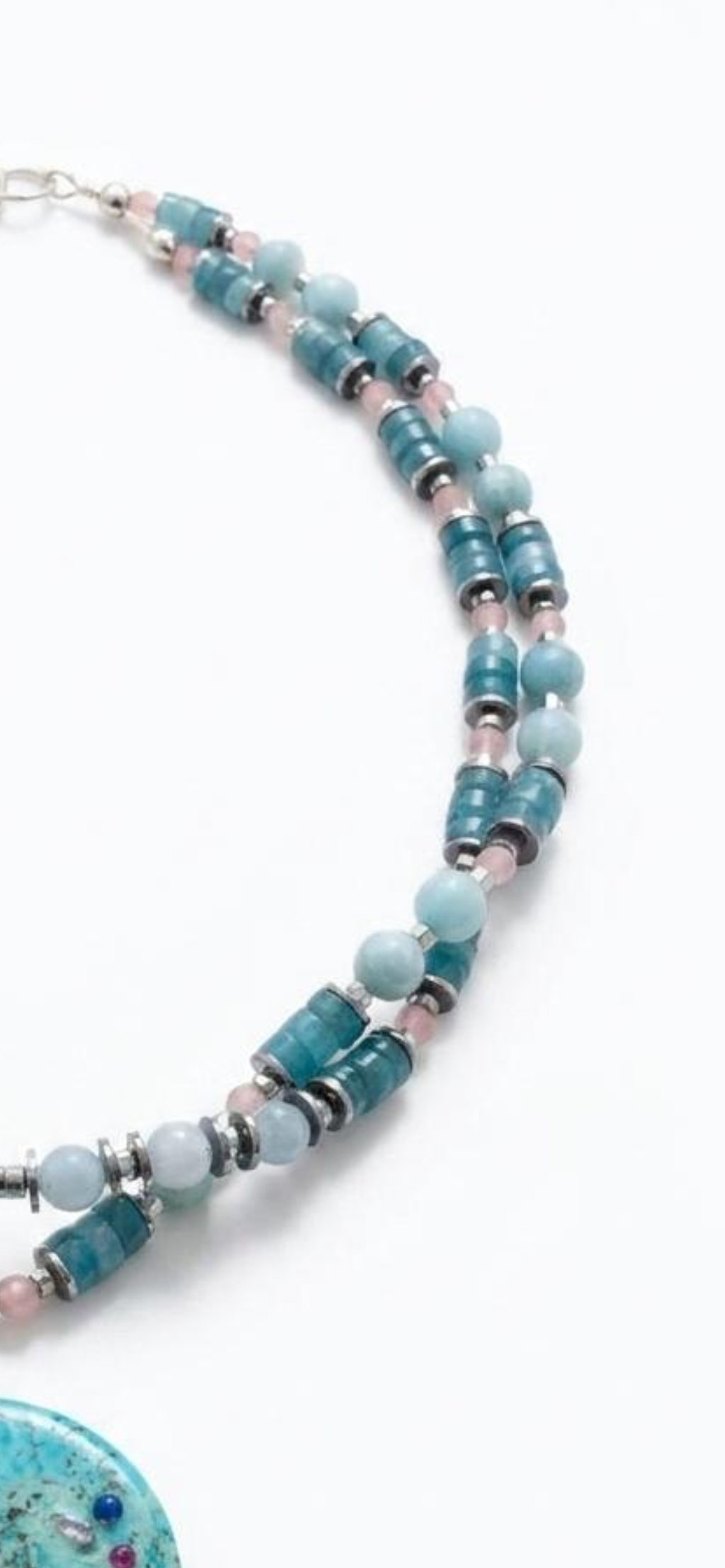 Aquamarine 
Rose quartz 
Amazonite 
Hematite 
Amazonite pendant with crystal 
Sterling silver 925