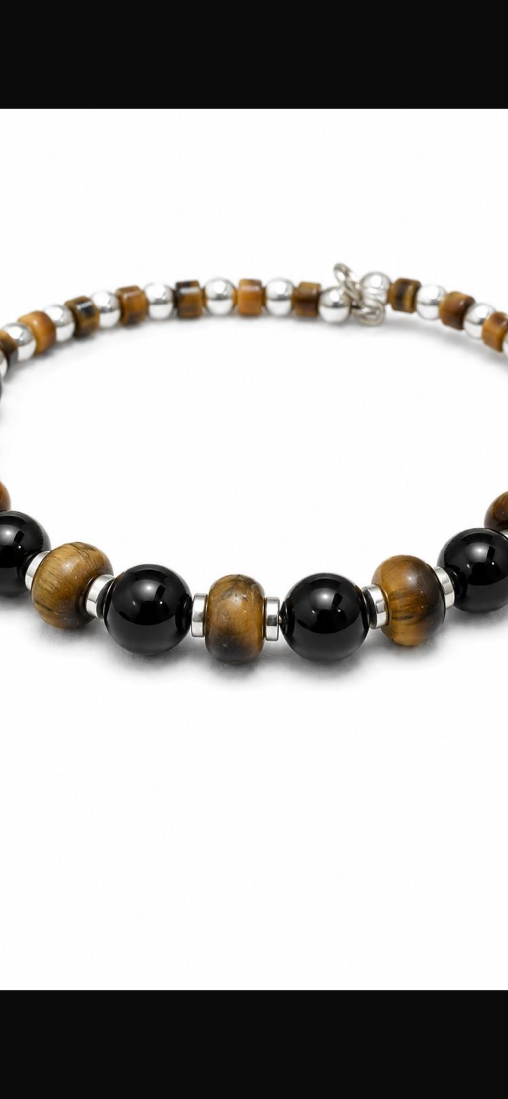 Nomad.        
Tiger eye
Onyx 
Hematite 
Sterling Silver 925
