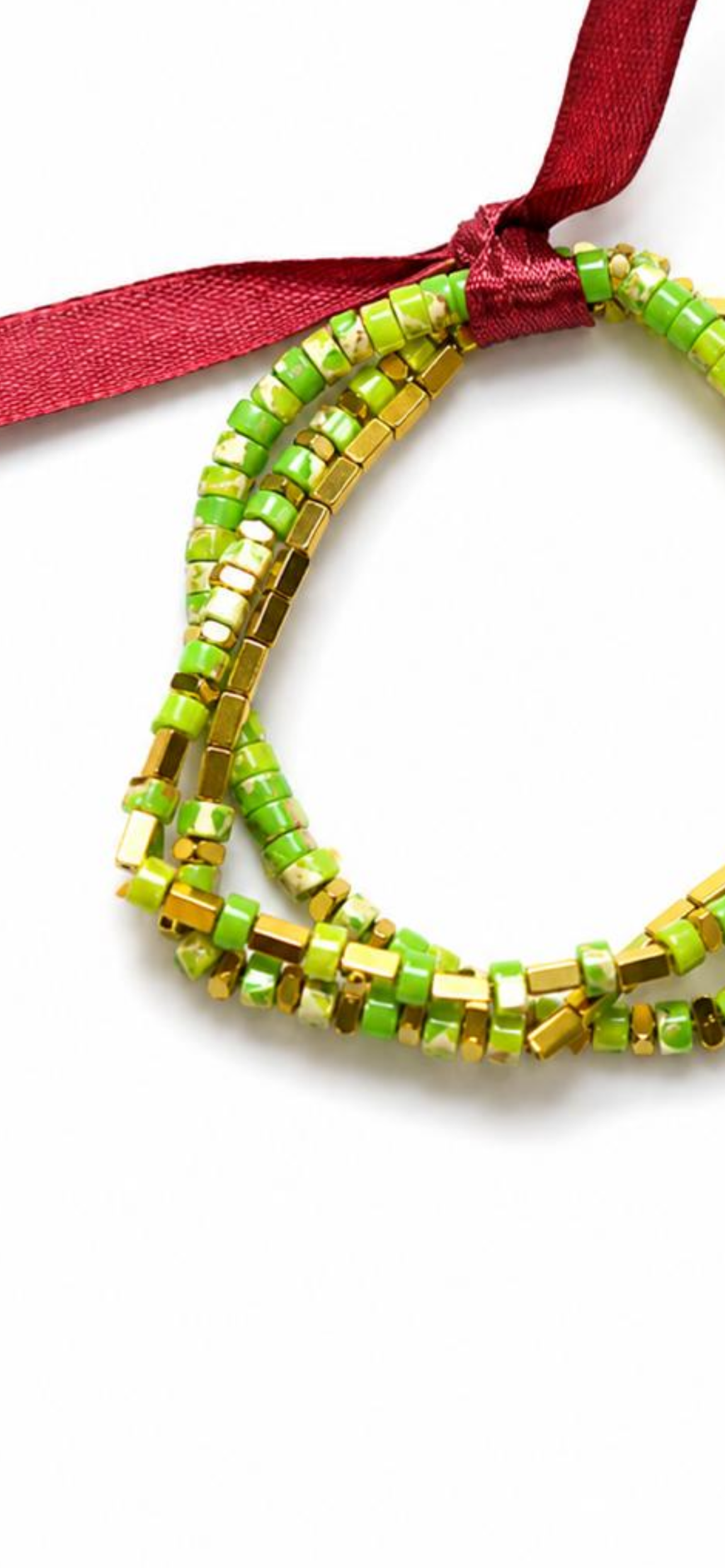 Lime breeze.    
Jasper
Hematite gold plated