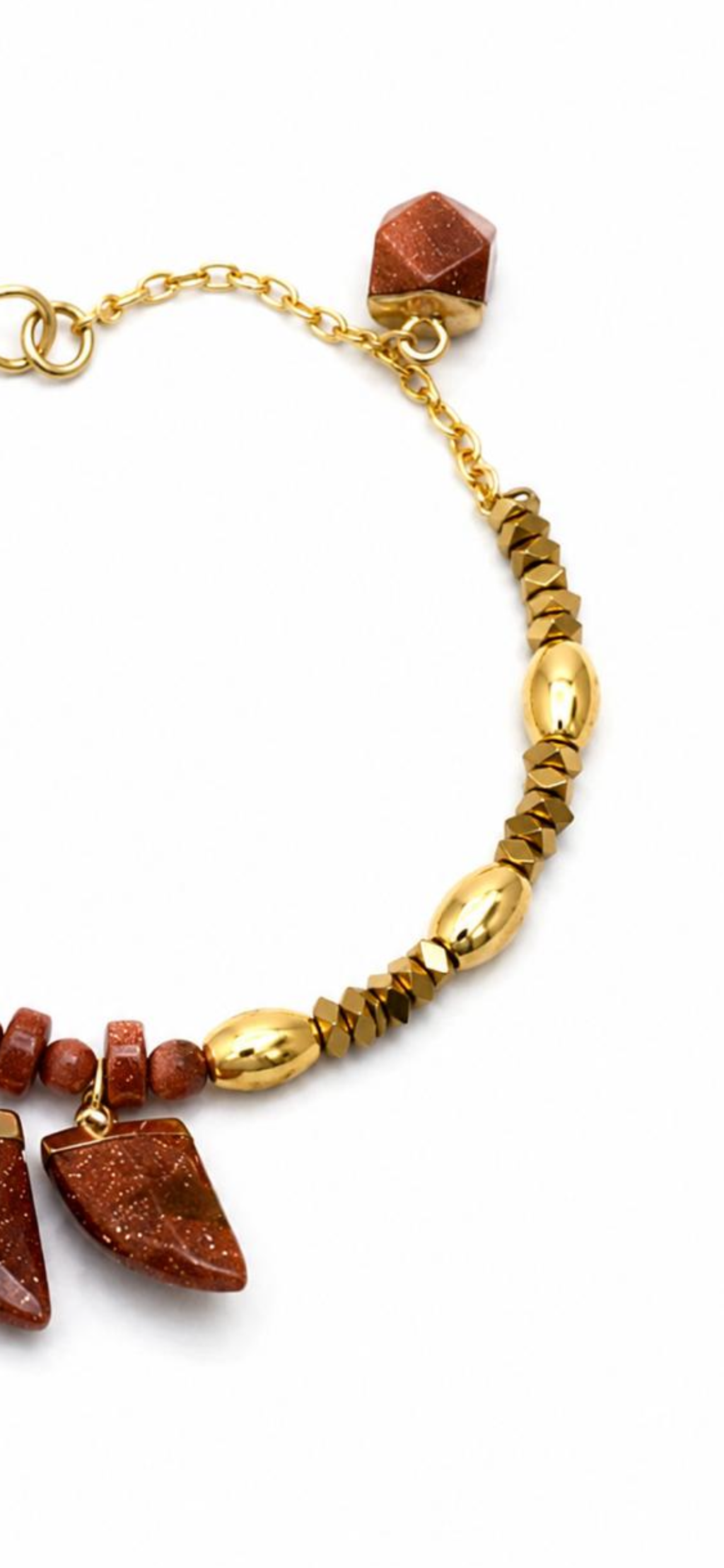 Golden sunset.     
Gold stone 
Hematite gold plated 
Sterling silver 925 gold plated