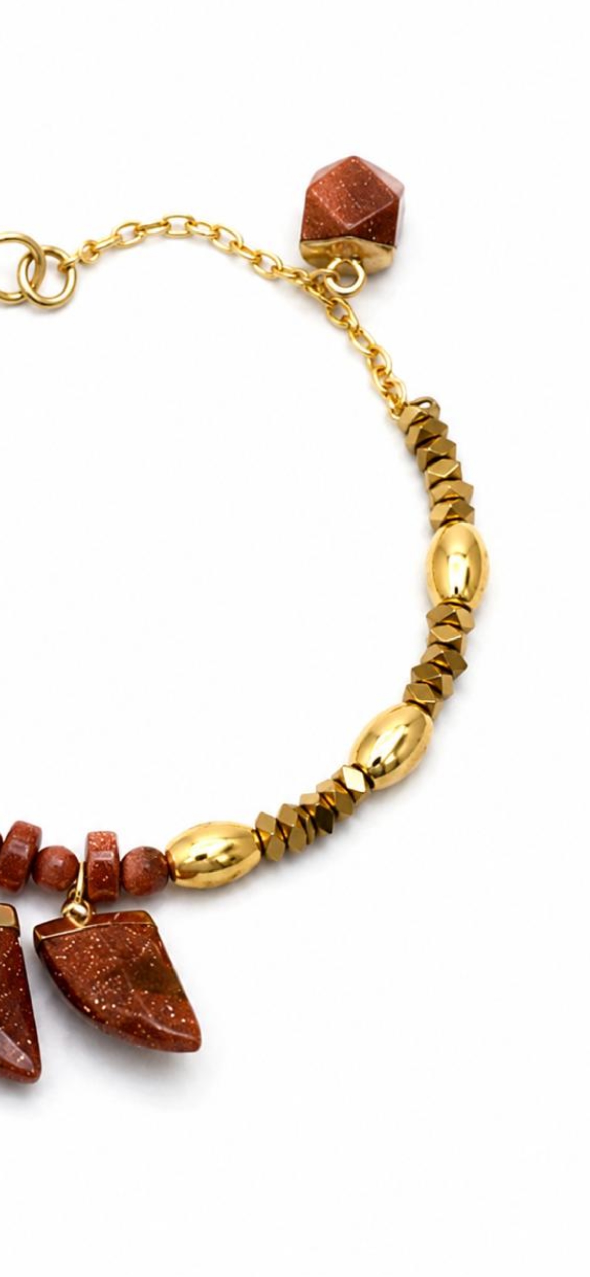 Golden sunset.     
Gold stone 
Hematite gold plated 
Sterling silver 925 gold plated
