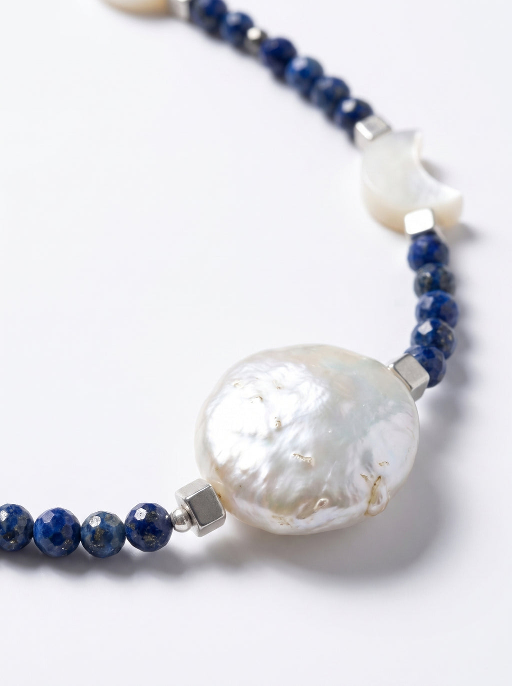 Onix 
Pearl 
Mother of pearl 
Hematite 
Sterling silver 925