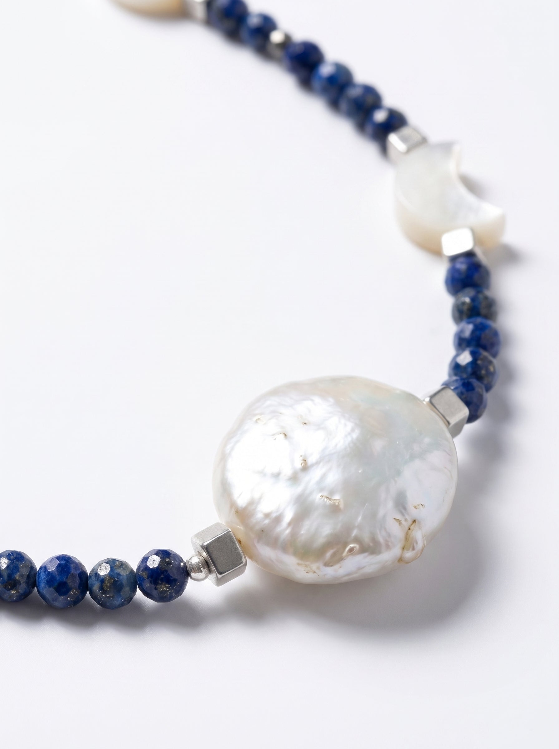 Onix 
Pearl 
Mother of pearl 
Hematite 
Sterling silver 925