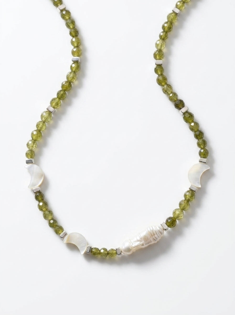 Olive jade 
Pearl 
Hematite 
Mother of pearl 
Sterling silver 925