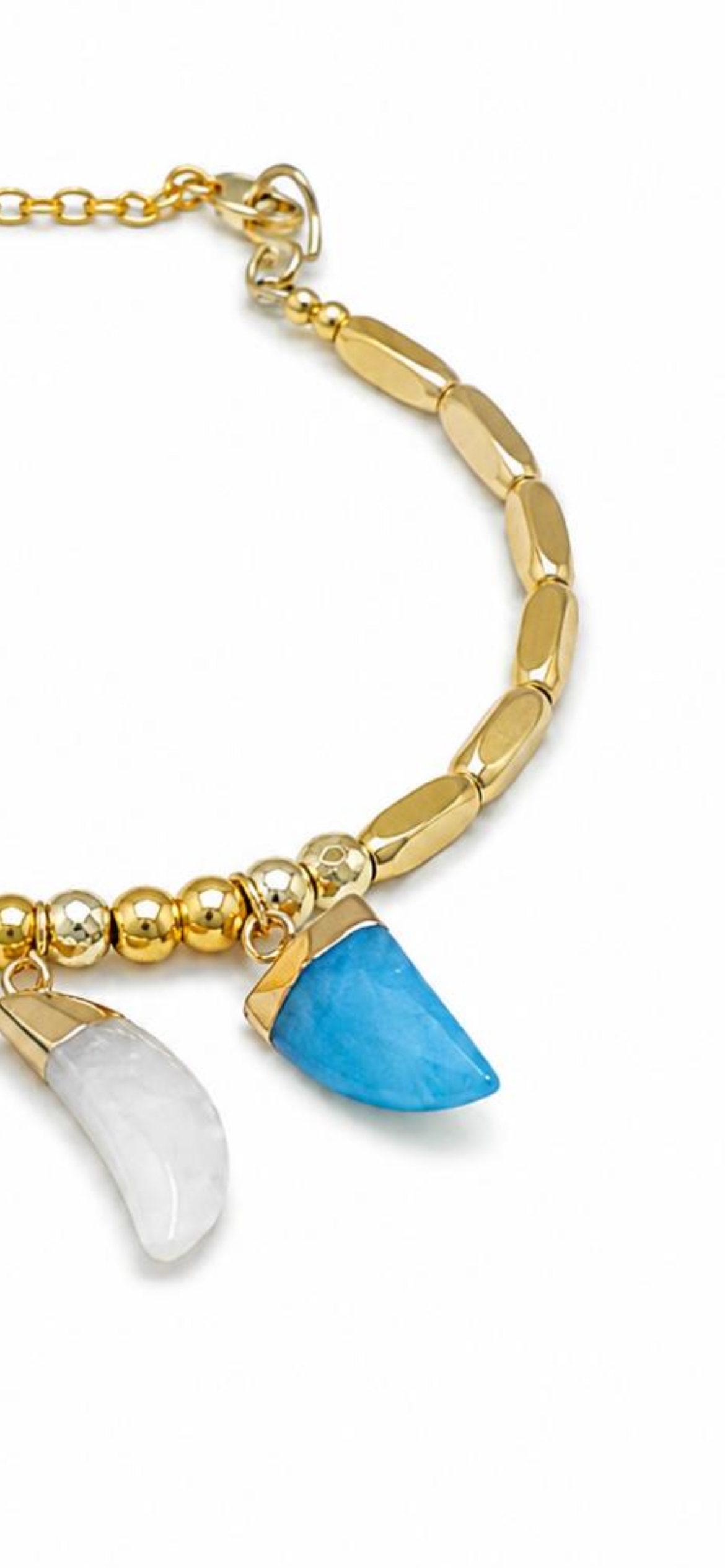 Sea spell.    
Blue ,white jade 
Hematite gold plated 
Sterling Silver 925 gold plated