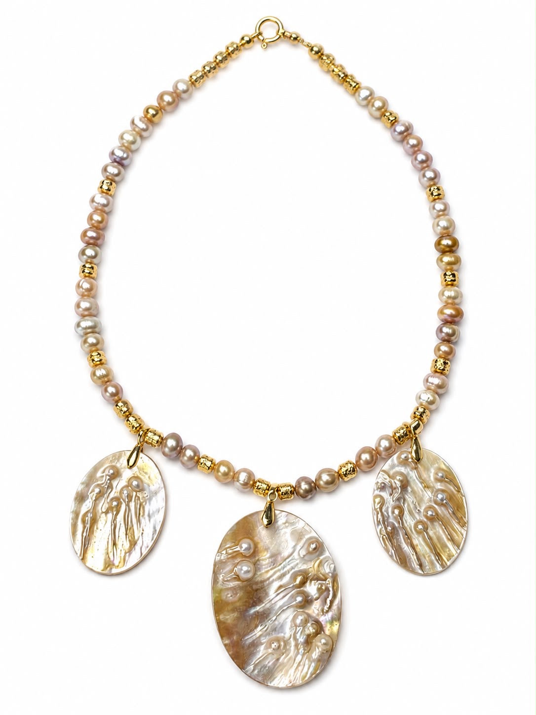 Sea treasure.      
Pearl 
Lava stone 
Hematite gold plated 
Parquet pearl pendant 
Sterling silver 925 gold plated
