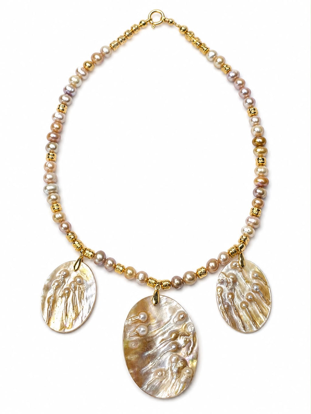 Sea treasure.      
Pearl 
Lava stone 
Hematite gold plated 
Parquet pearl pendant 
Sterling silver 925 gold plated