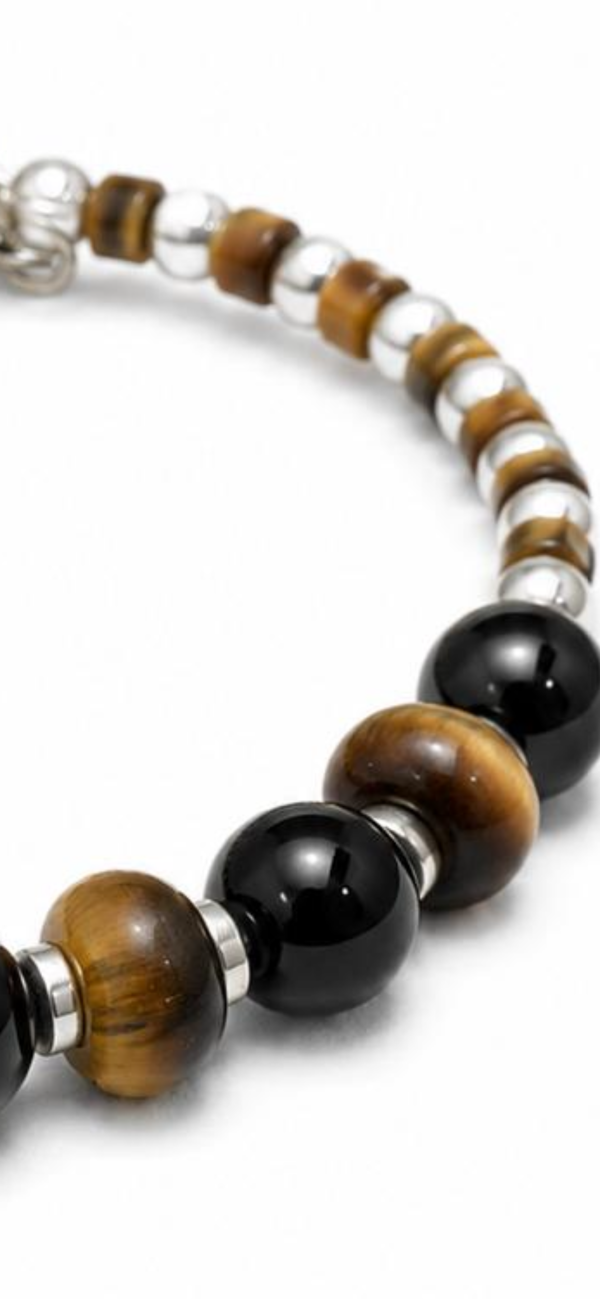Nomad.        
Tiger eye
Onyx 
Hematite 
Sterling Silver 925