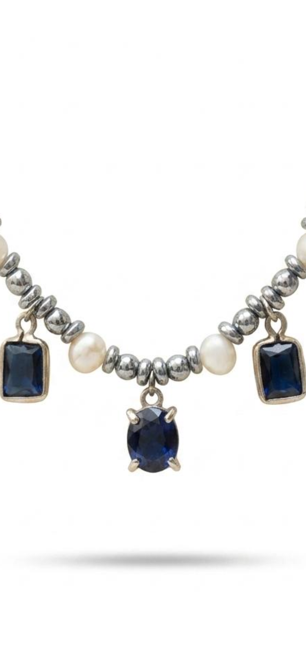 White and grey pearl
Hematite 
Blue crystal 
Blue Cubic zirconia pendants 
Sterling silver 925