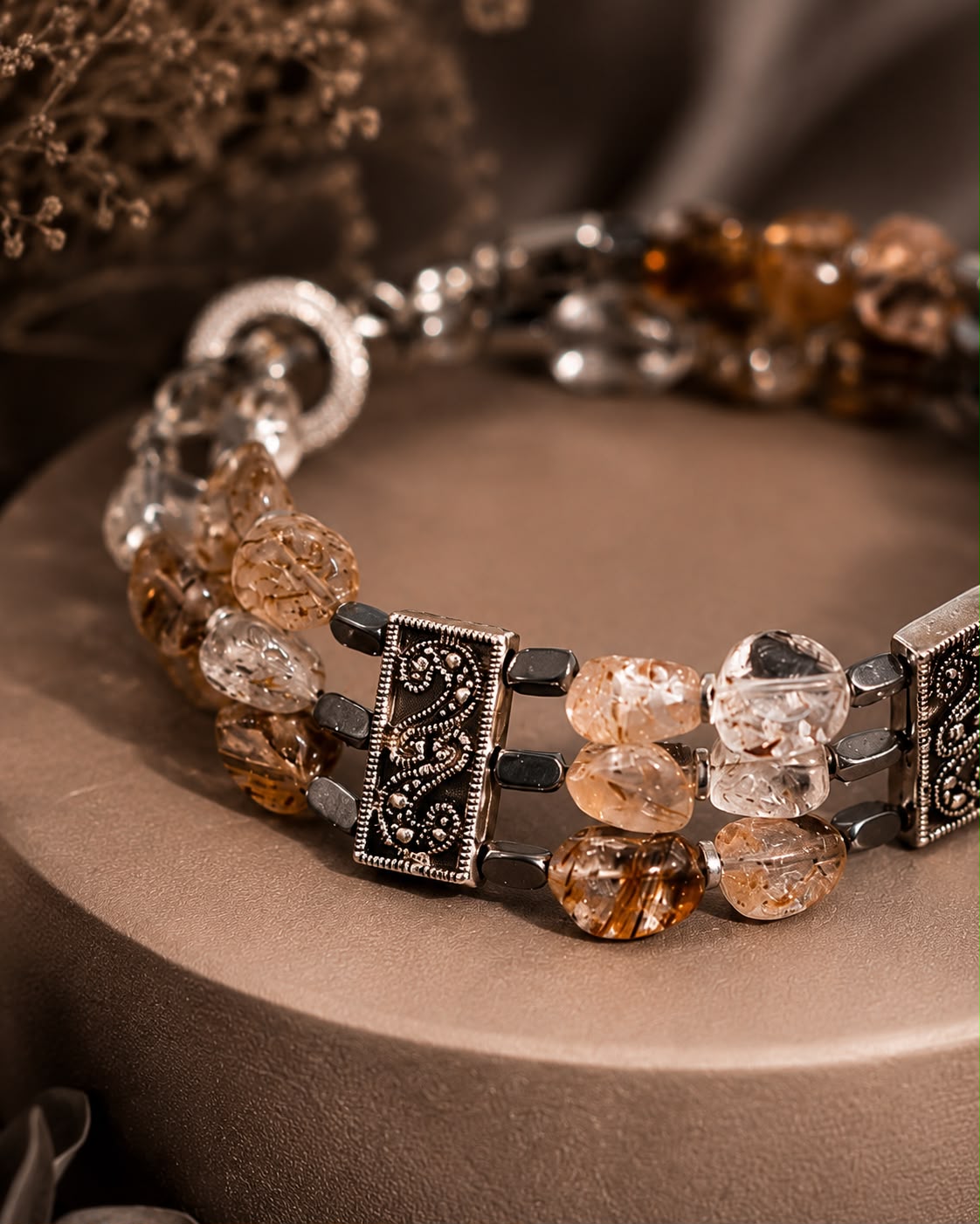 Desert glow.    
Rotel quartz 
Hematite 
Sterling Silver 925