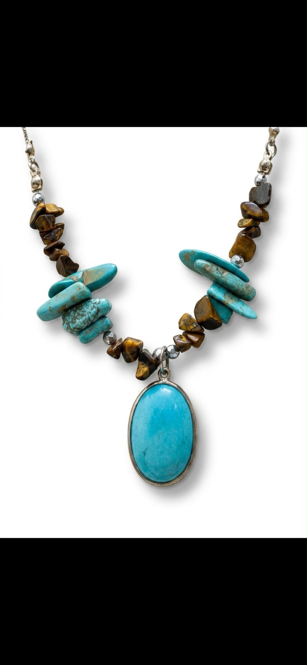 Turquoise pendant 
Tiger aye 
Hematite 
Sterling silver 925